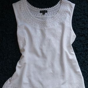 White sleeveless top